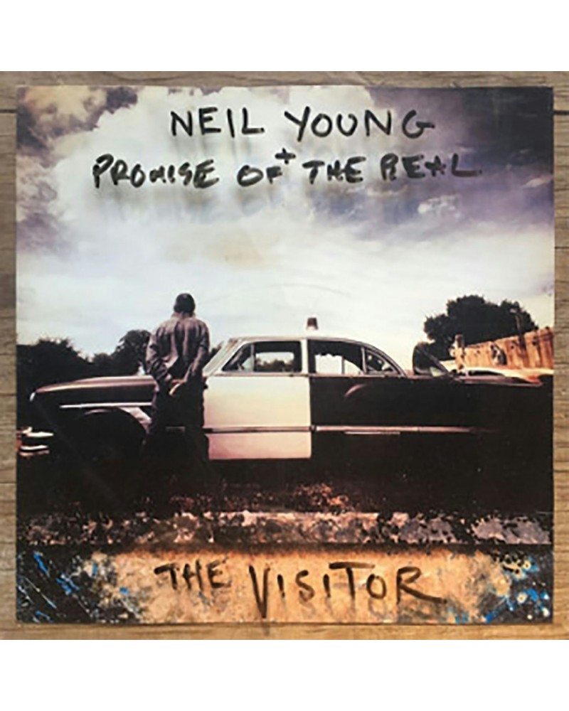 Neil Young VISITOR Vinyl Record $14.80 Vinyl